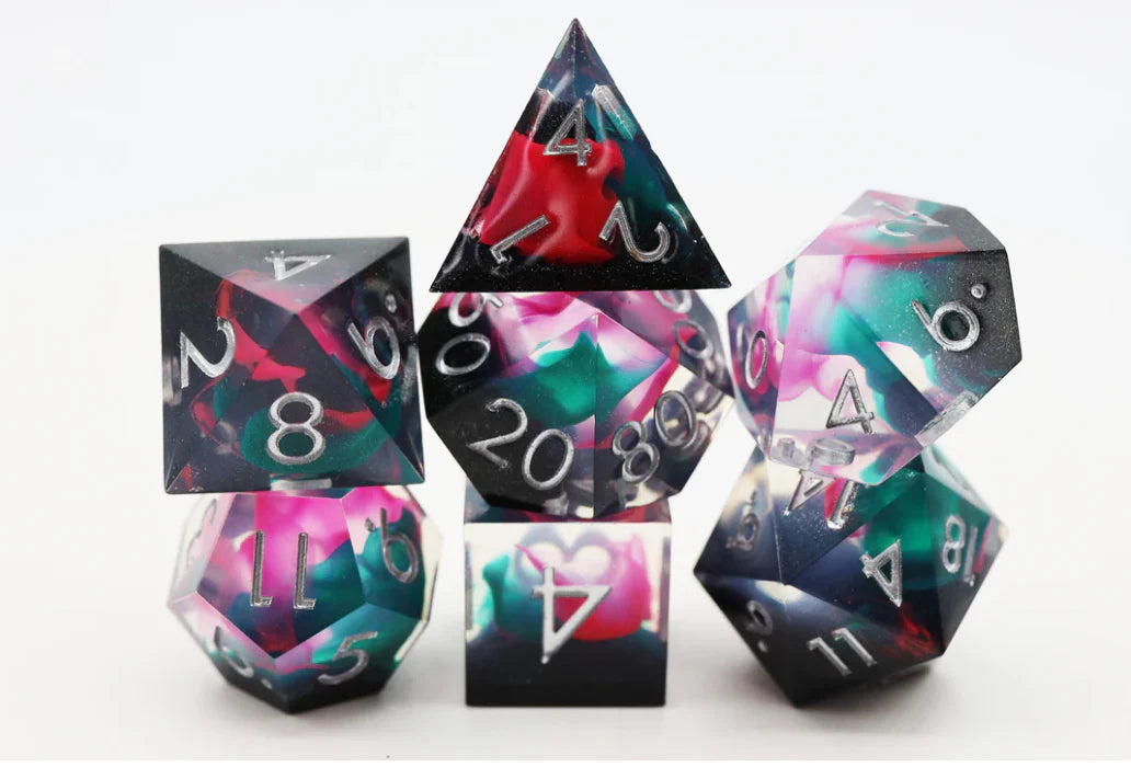 Sharp Edge Resin RPG Dice Set, Daytona variant with white numbers, arranged in a pyramid on a white background.