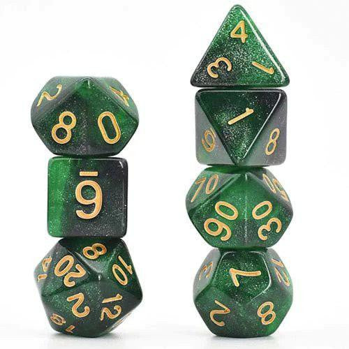 Two stacks of Black & Green Galaxy RPG dice with gold numbers.