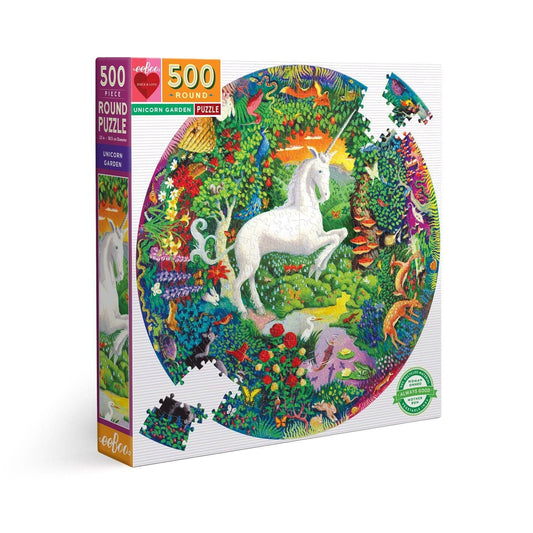 The Unicorn Garden 500 Piece Round Puzzle showing a white unicorn in a garden with animals and plants.