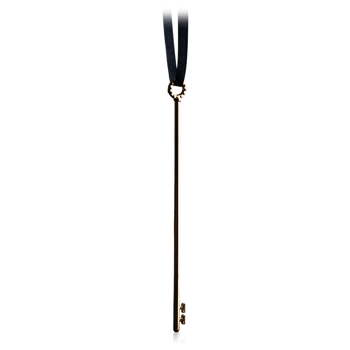 Brass skeleton key puzzle on a black ribbon.