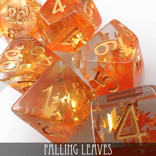 Falling Leaves dice set: amber resin with gold numbers and embedded leaves.