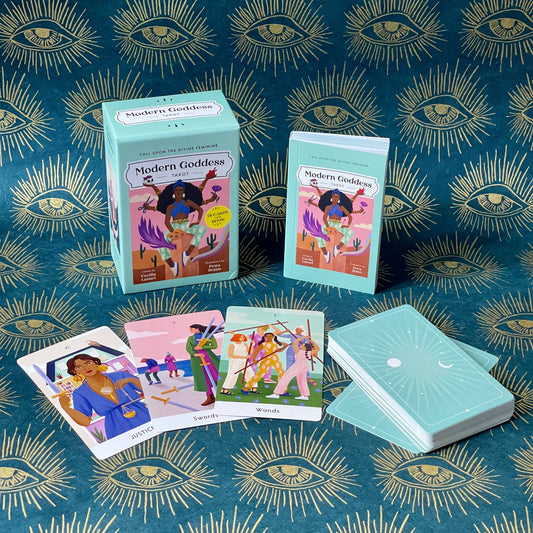 The Modern Goddess Tarot Deck by Petra Braun with illustrated cards, guidebook, and box.