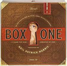 Box One by Neil Patrick Harris interactive game box with keyhole and eye design on the cover.