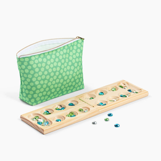 Canvas Classics Mancala game with folding board, colorful glass stones, and green polka dot pouch.