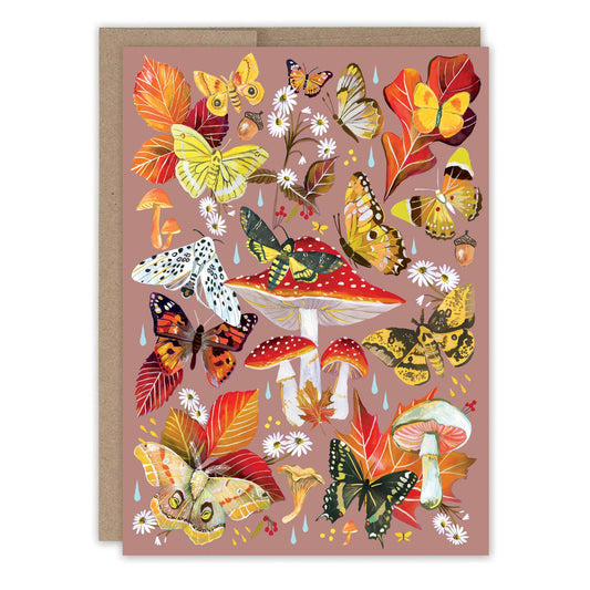 Autumn Flutter Birthday Card with butterflies, mushrooms, and autumn leaves on recycled paper.