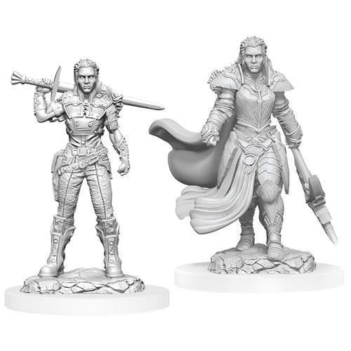 D&D Nolzurs W20: two unpainted female orc fighter miniatures, one in light armor, one in heavy armor with cape and sword.