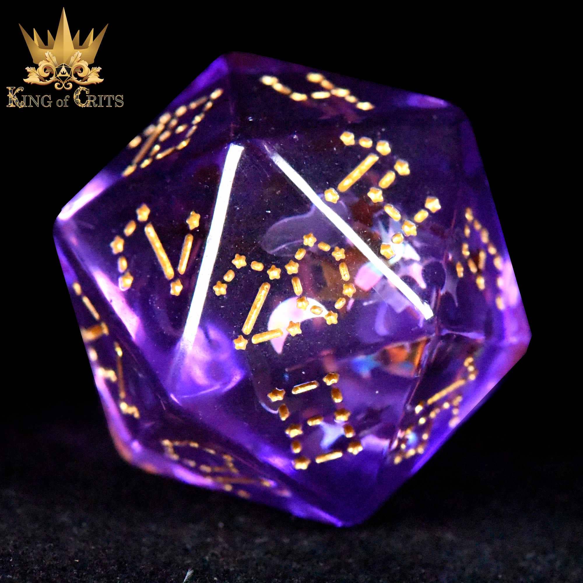 Moonlit Night 12-piece translucent purple DND dice set with gold-on-black numbers and King of Crits logo.