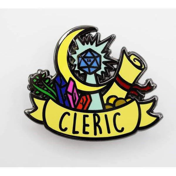 Enamel pin featuring a moon, crystals, scroll, dice, and a yellow CLERIC banner in bold black letters.