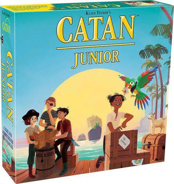 Catan Junior family board game with kids and a parrot on a tropical island, pirate-themed edition.