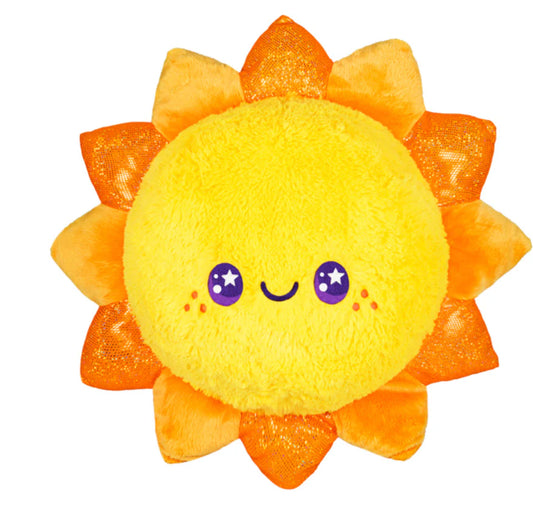 Squishable Celestial Sun plush with orange rays, smiling face, rosy cheeks, and large starry eyes.