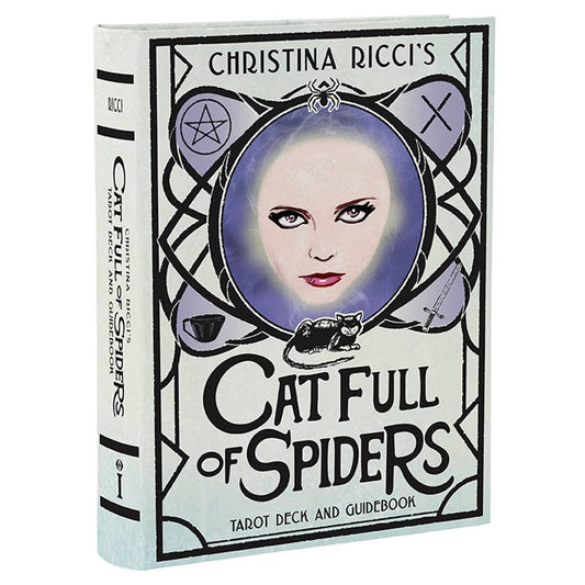 Christina Riccis Cat Full of Spiders Tarot Deck and Guidebook with cards and a cover showing a womans face.