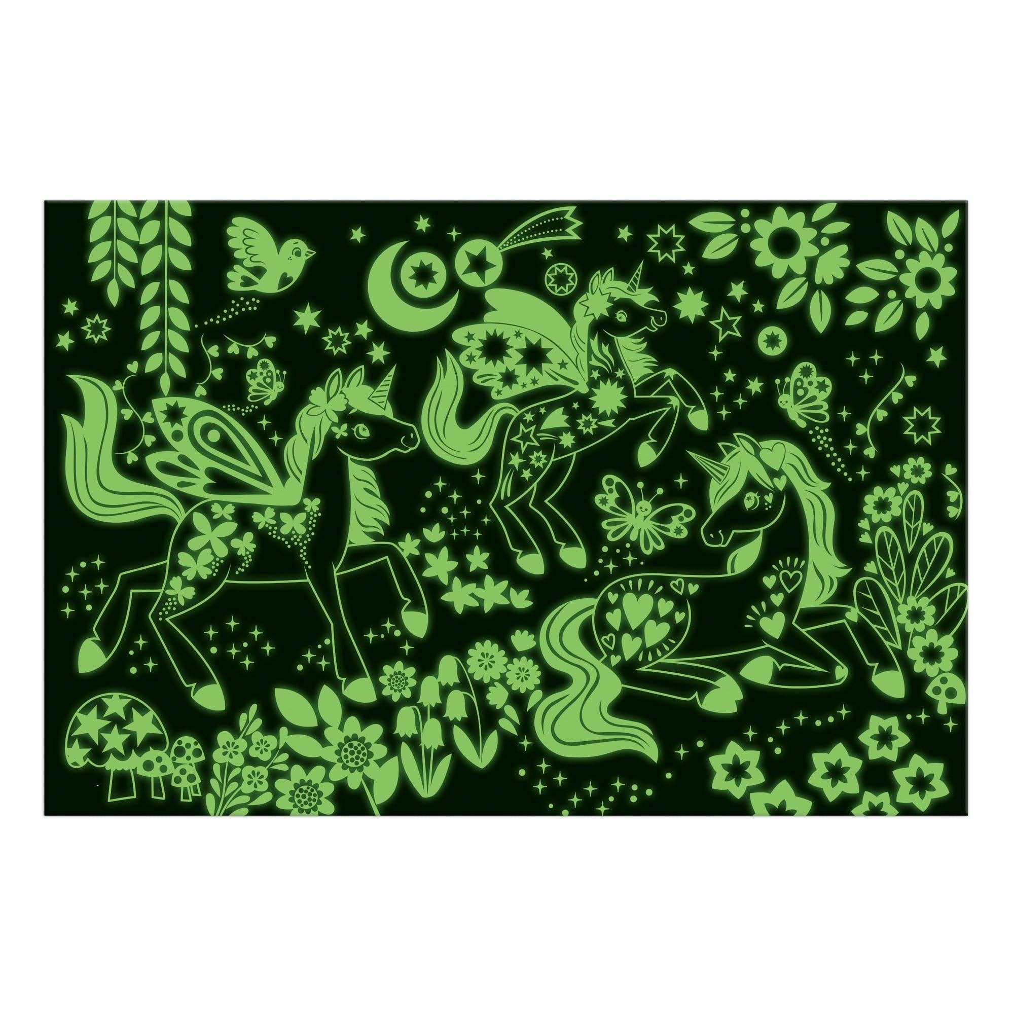 Unicorn Dreams 100 Piece Glow in the Dark Puzzle featuring unicorns, flowers, stars, and butterflies on black background.