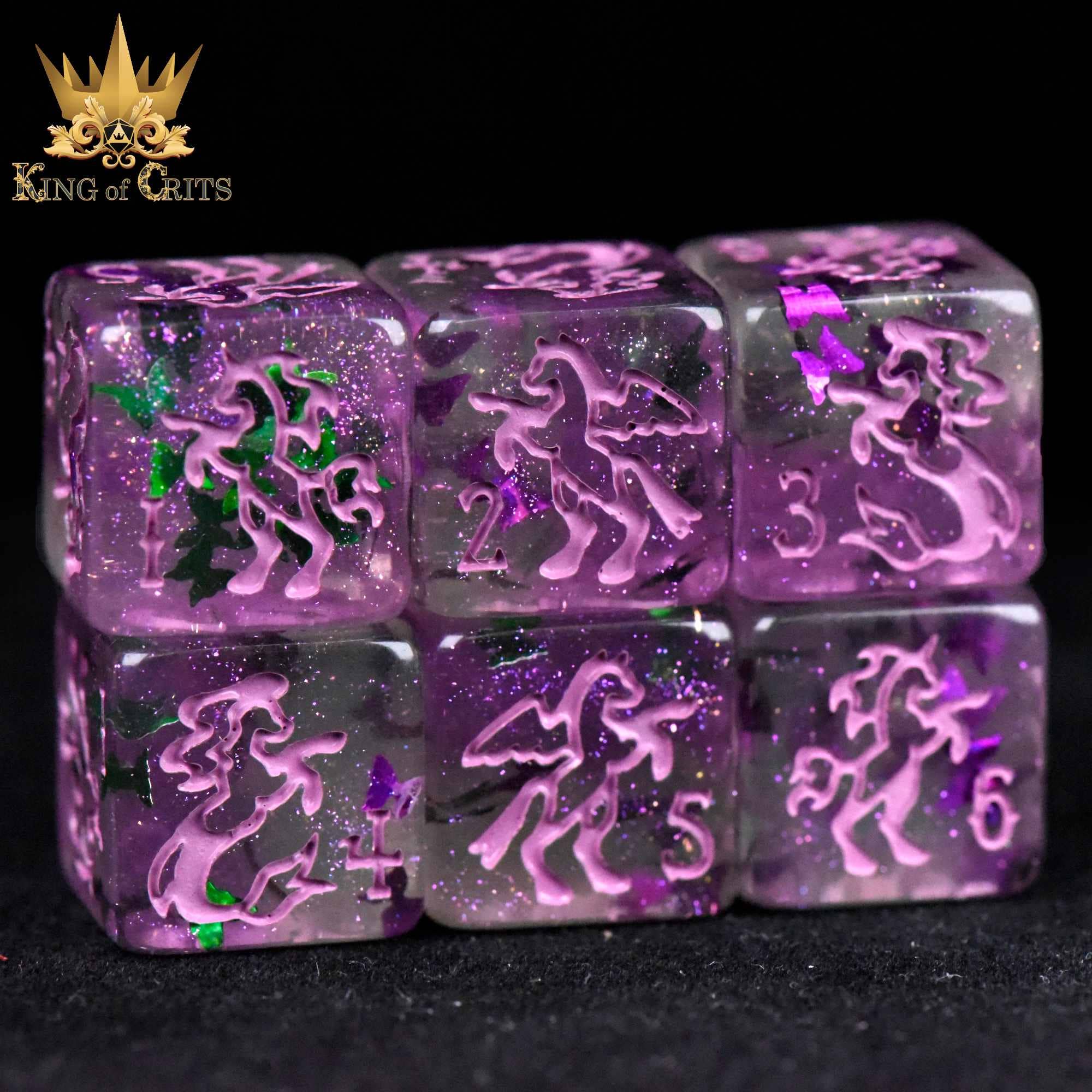 Fairy Flight 11-piece dice set with unicorn designs and numbers, displayed on a black background with King of Crits logo.