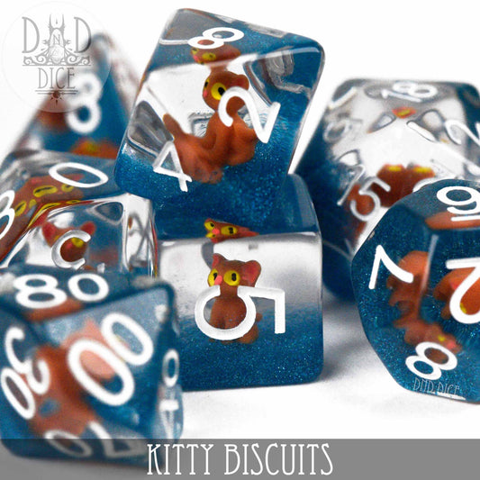 7-piece blue resin DnD dice set with small orange cat figures inside.