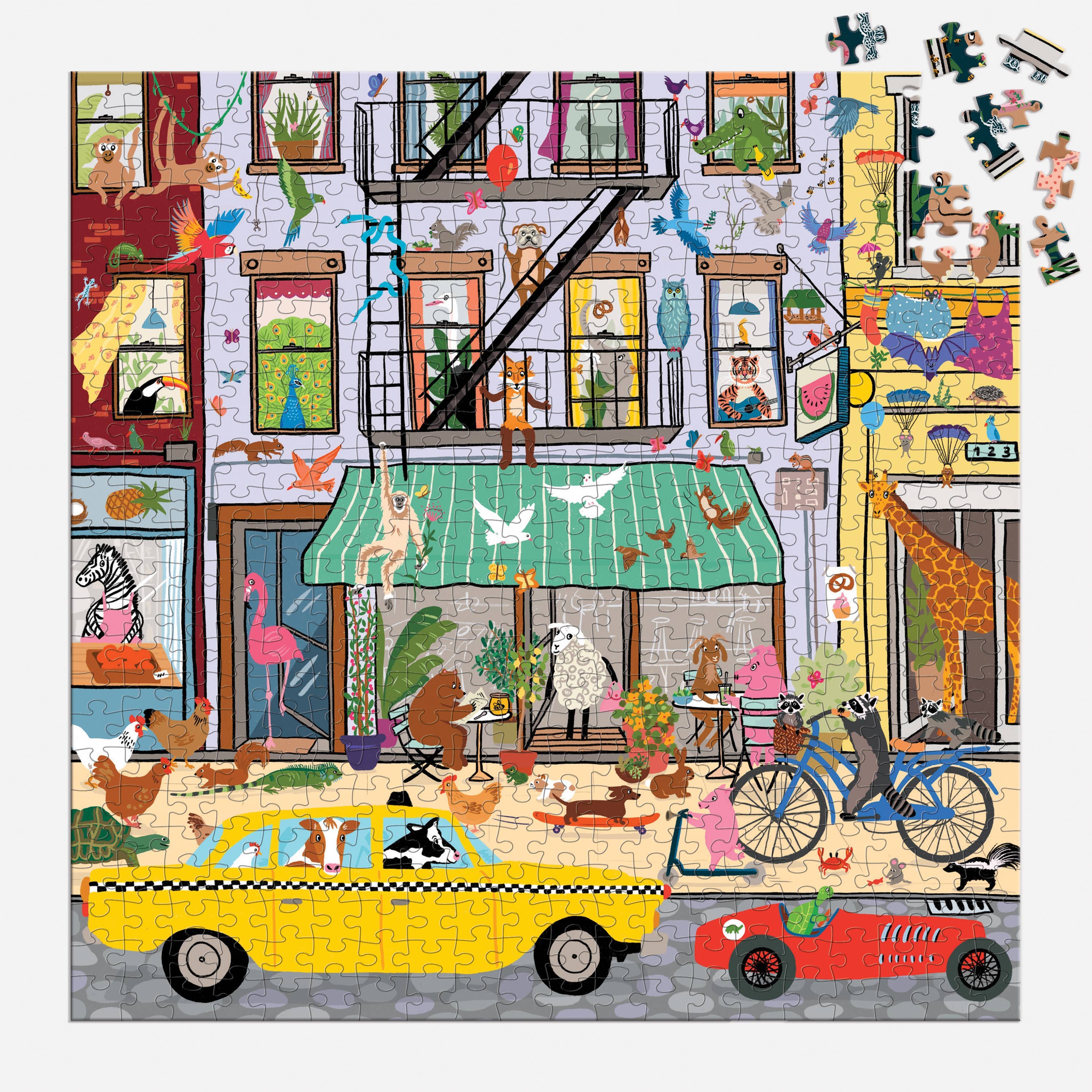 Critter City 500 Piece Family Puzzle with animals in a city, yellow taxi, bike, and birds on buildings.
