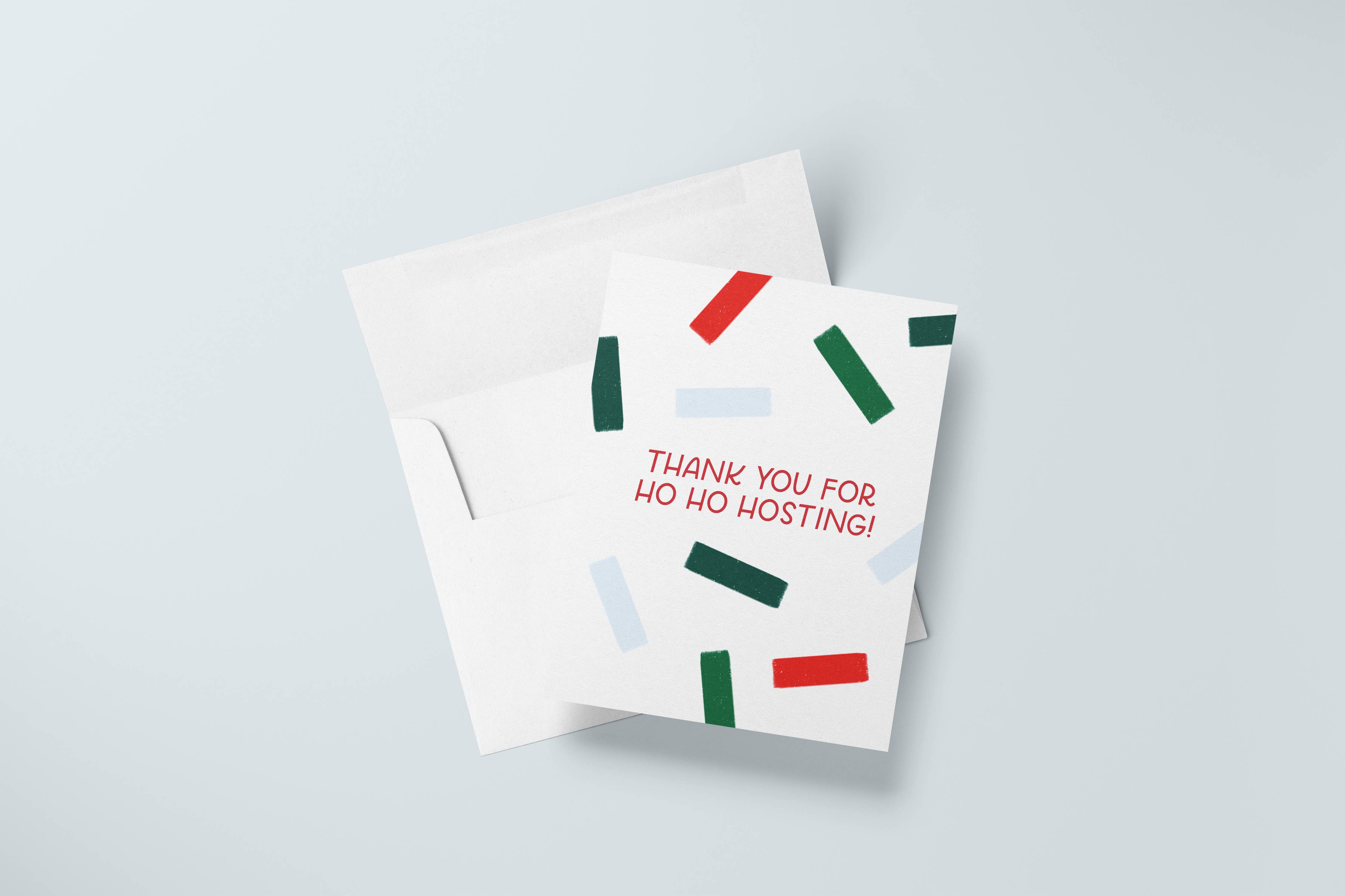 Ho Ho Hosting holiday card with envelope. Text reads: Thank you for ho ho hosting.