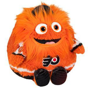 Round orange plush Gritty with big eyes, Flyers logo on chest, black hands and feet.