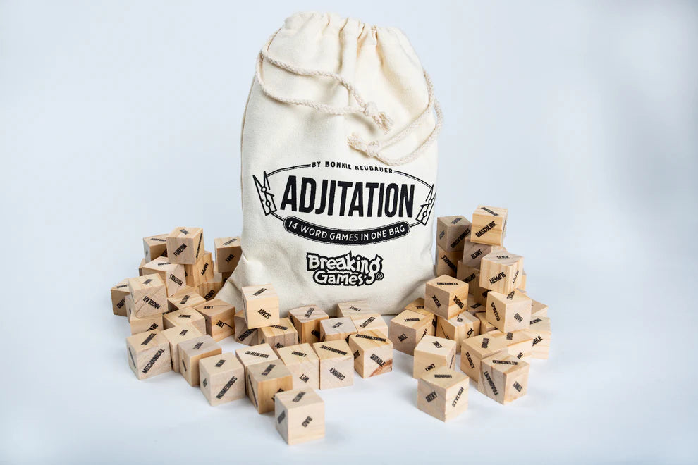 ADJitation word game cloth bag with wooden adjective cubes.