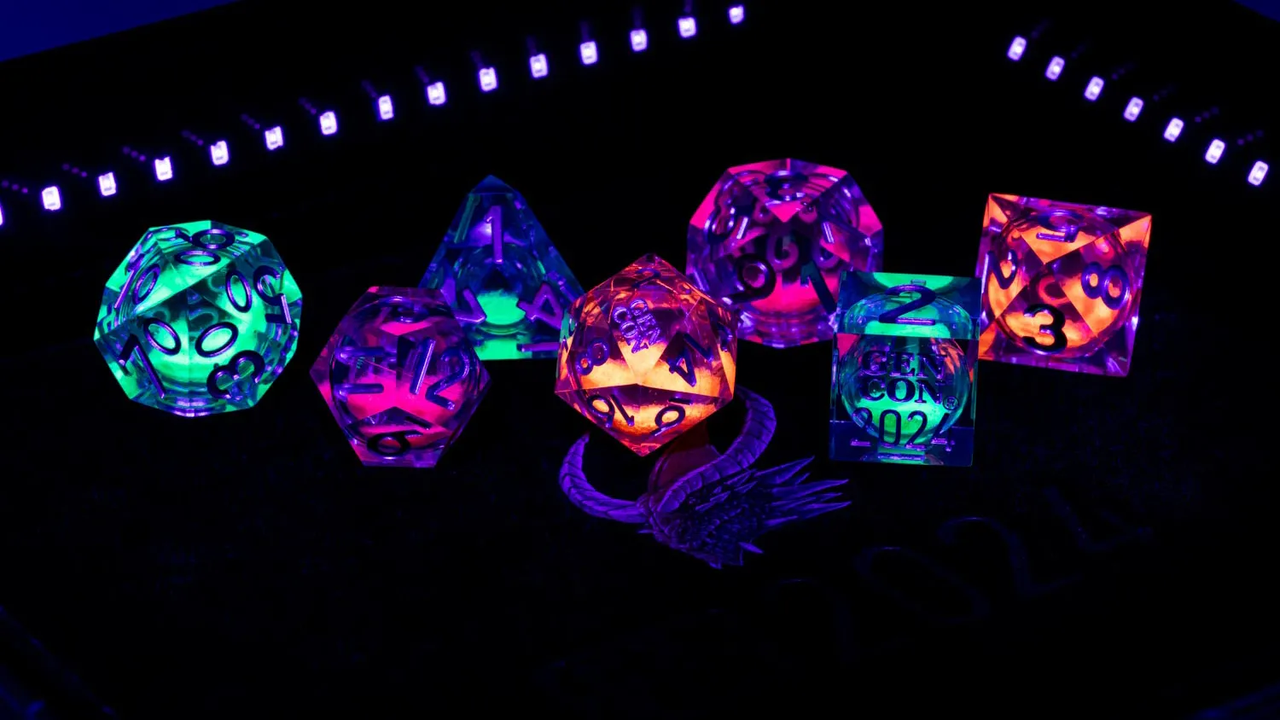 Gen Con 2024 Exclusive Liquid Core UV Reactive Set of seven dice that glow with patterns under blacklight.