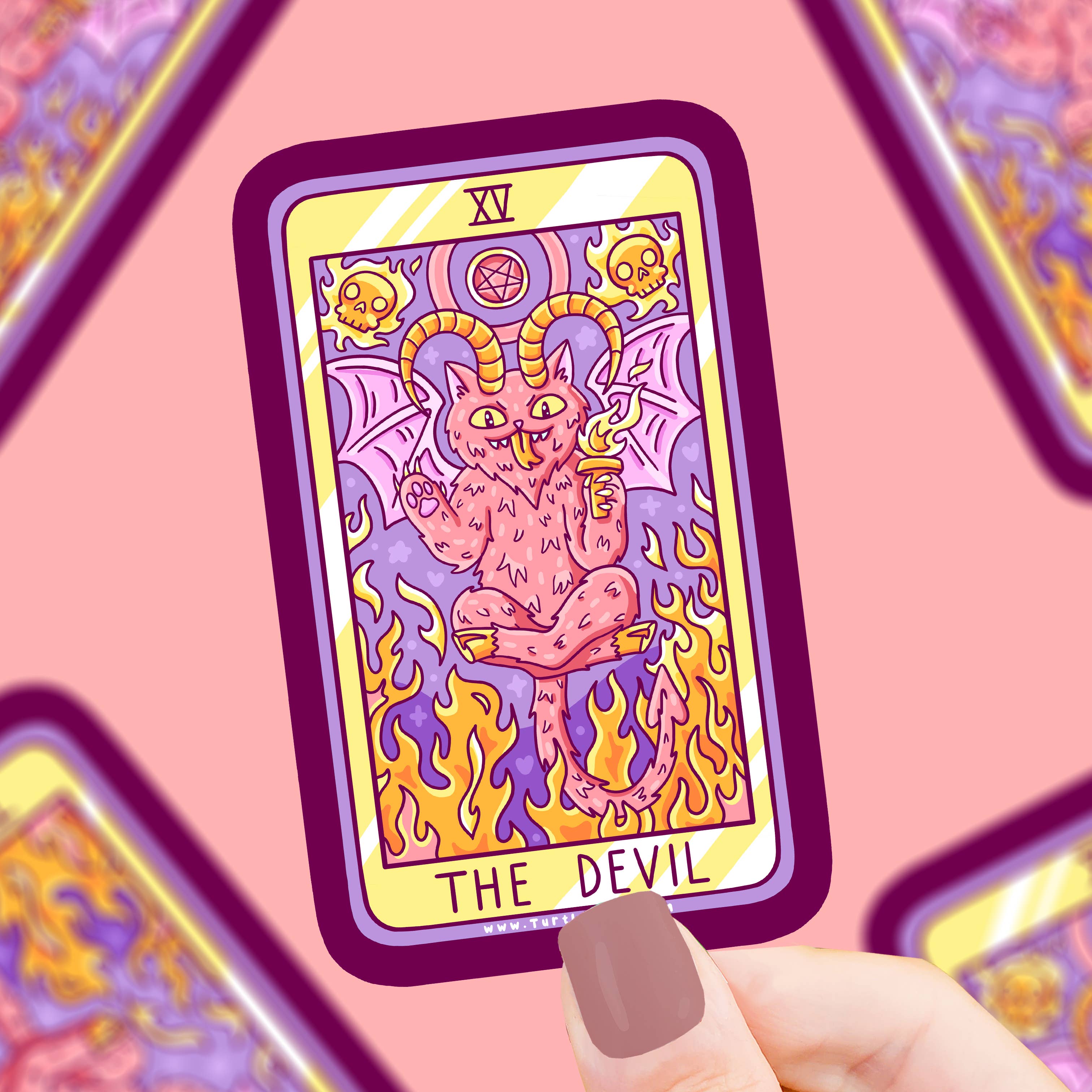 The Devil Cat Major Arcana Tarot Card Vinyl Sticker featuring a cartoon devil cat and flames held in a hand.