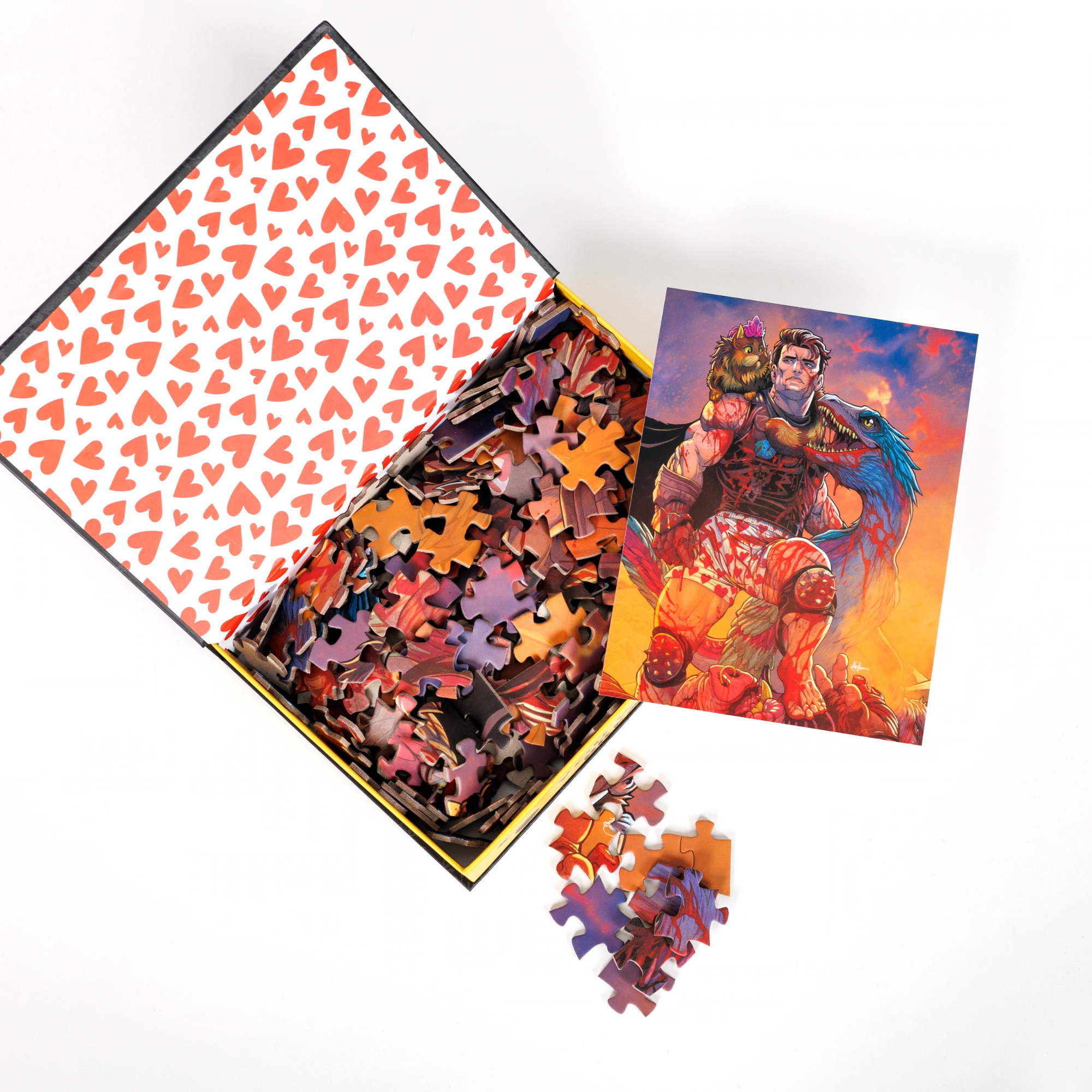 Found Family Keepsake Puzzle with heart-shaped lid and Dungeon Crawler Carl artwork.