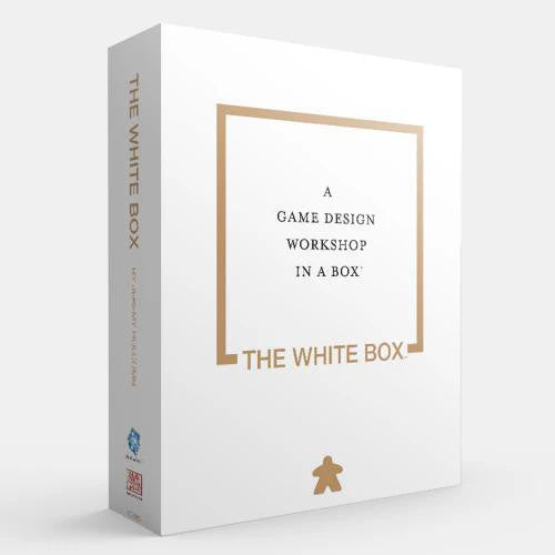 The White Box product with gold text, including components for game design prototyping.