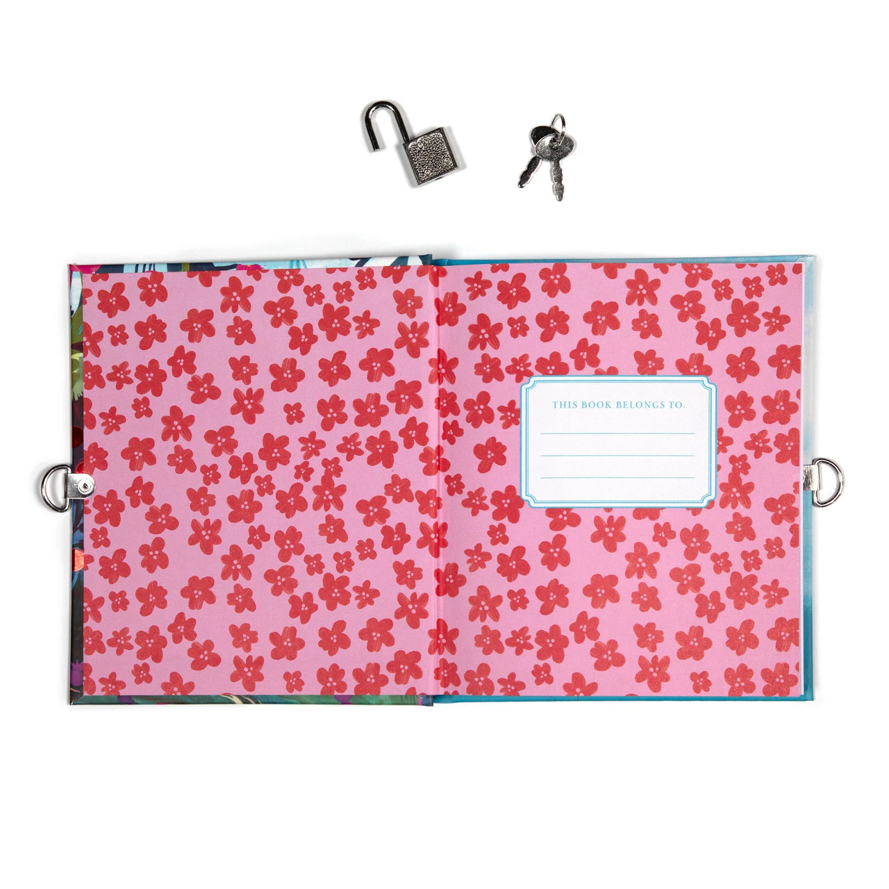 The Magical Creatures Journal with foil-stamped lock and key, pink floral cover, and illustrated interior pages.