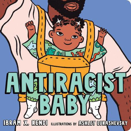 Antiracist Baby Board Book by Ibram X. Kendi shown with a baby in a carrier.