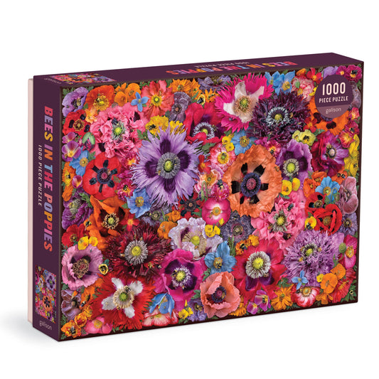 The Bees in the Poppies 1000 Piece Puzzle with colorful poppies and assorted flowers on the cover.