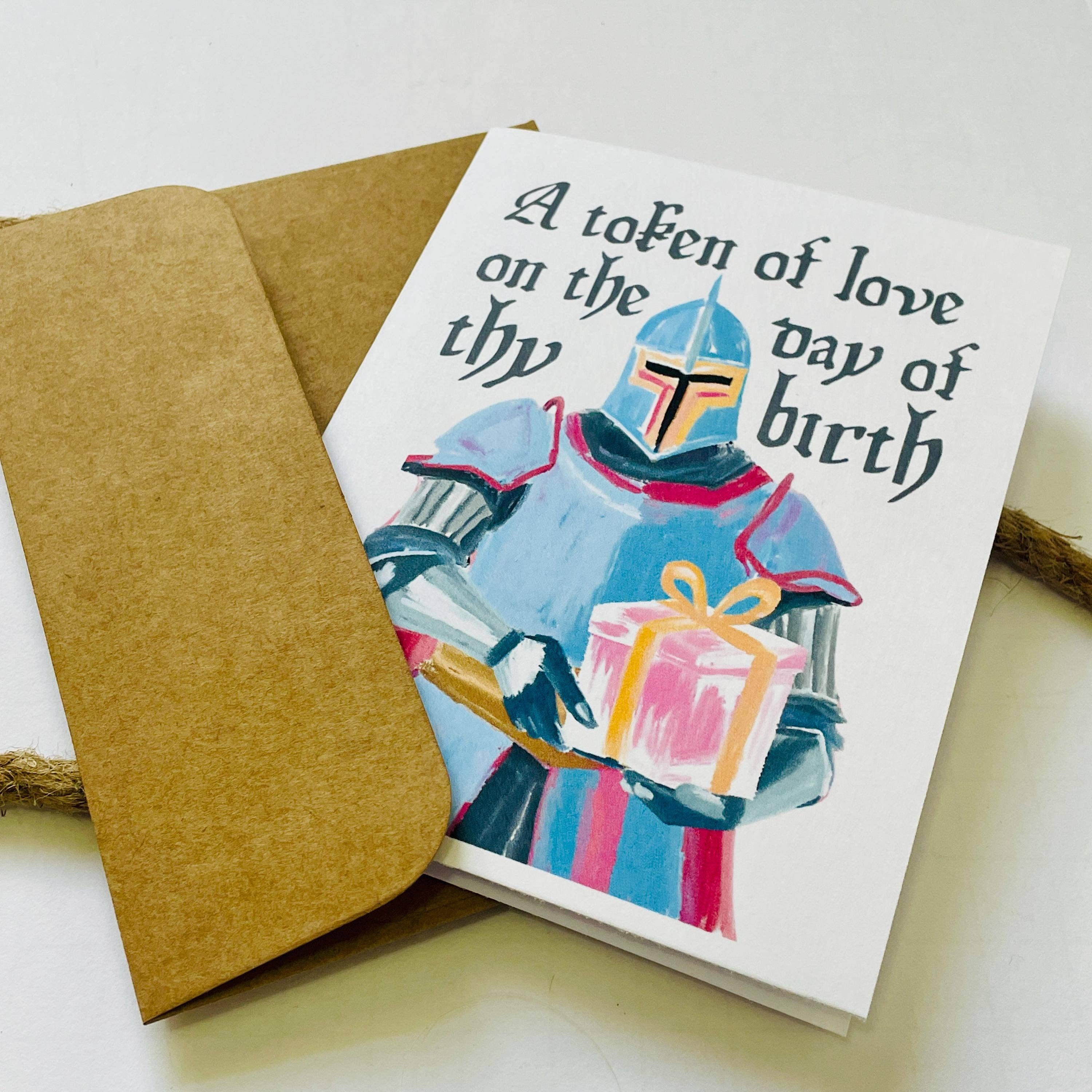 Medieval & Renaissance Role-Playing Birthday Card featuring knight and gift, with kraft envelope included.