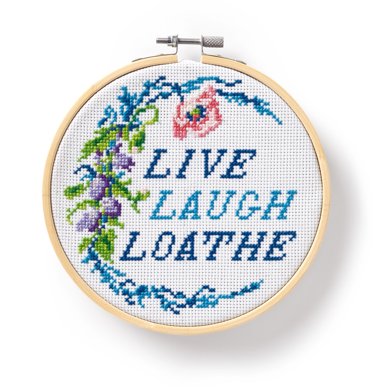 Live Laugh Loathe Cross Stitch Kit with floral design and blue thread, suitable for beginner embroidery.