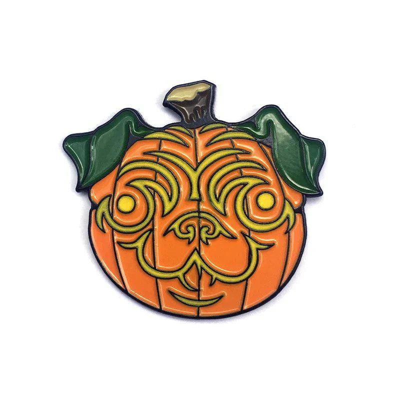 Kolorspun Pins Pumpkin Pug Halloween enamel pin with a swirly dog face, green leaf ears, and a brown stem.