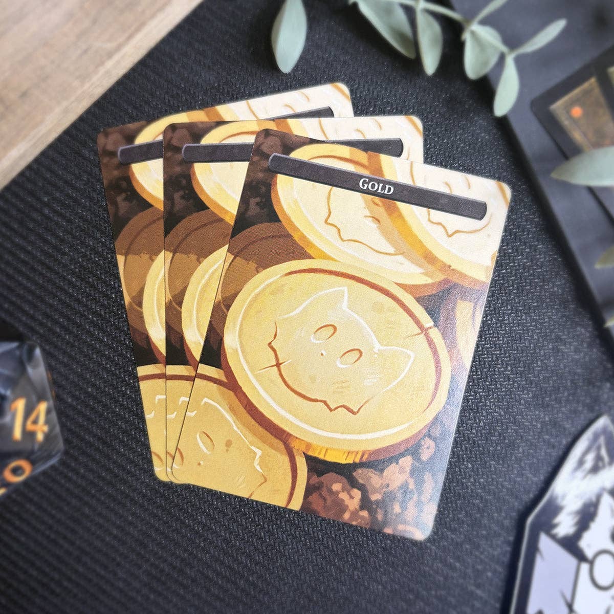 Three Gold & Goblin Tokens featuring gold cat faces labeled GOLD.