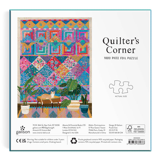 Victoria Ball Quilter’s Corner 1000 Piece Foil Puzzle with quilt, cat, and plants on the box.