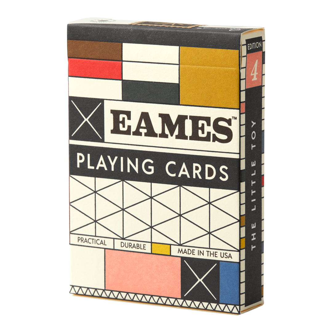 Eames The Little Toy playing cards in a geometric grid box of black, white, red, yellow, and blue.