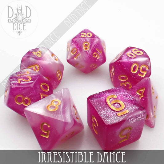 Pink and white acrylic dice set with gold numbers, Irresistible Dance variant by DnD Dice.