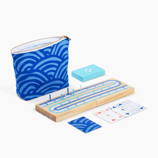 Canvas Classics Cribbage set with blue zip pouch, cards, and pegs on a white background.