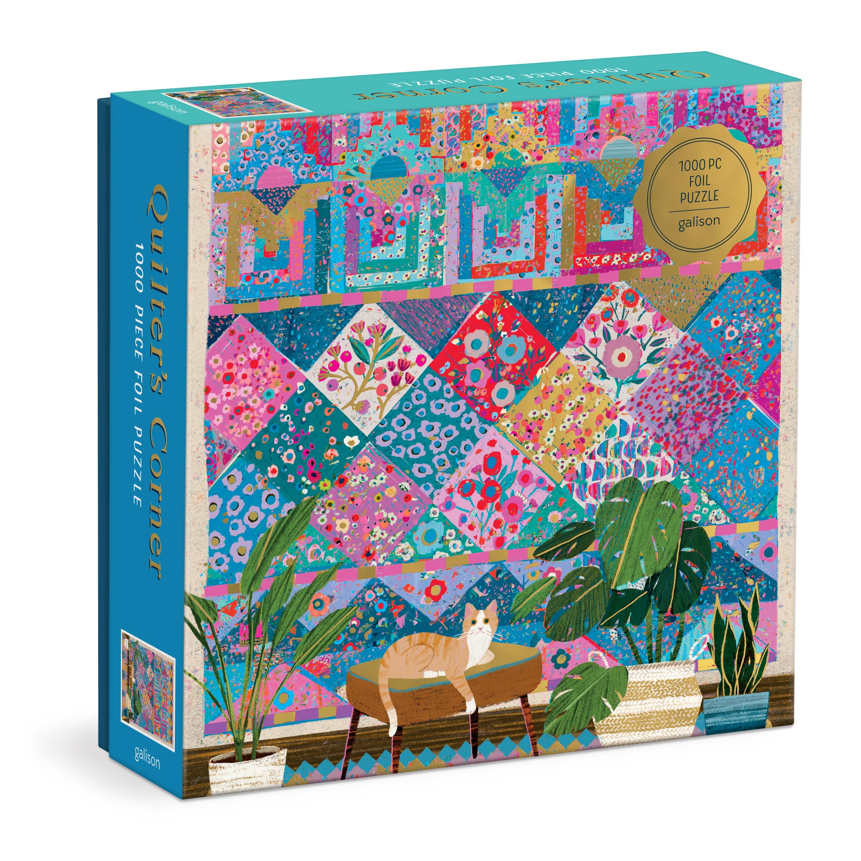 Victoria Ball Quilter’s Corner 1000 Piece Foil Puzzle featuring a cat on bench, vibrant quilt, and green plants.
