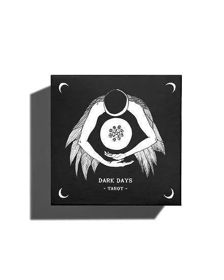 Classic Matte Dark Days Tarot Deck with black and white cards in a box featuring crescent moons and a moon-faced figure.