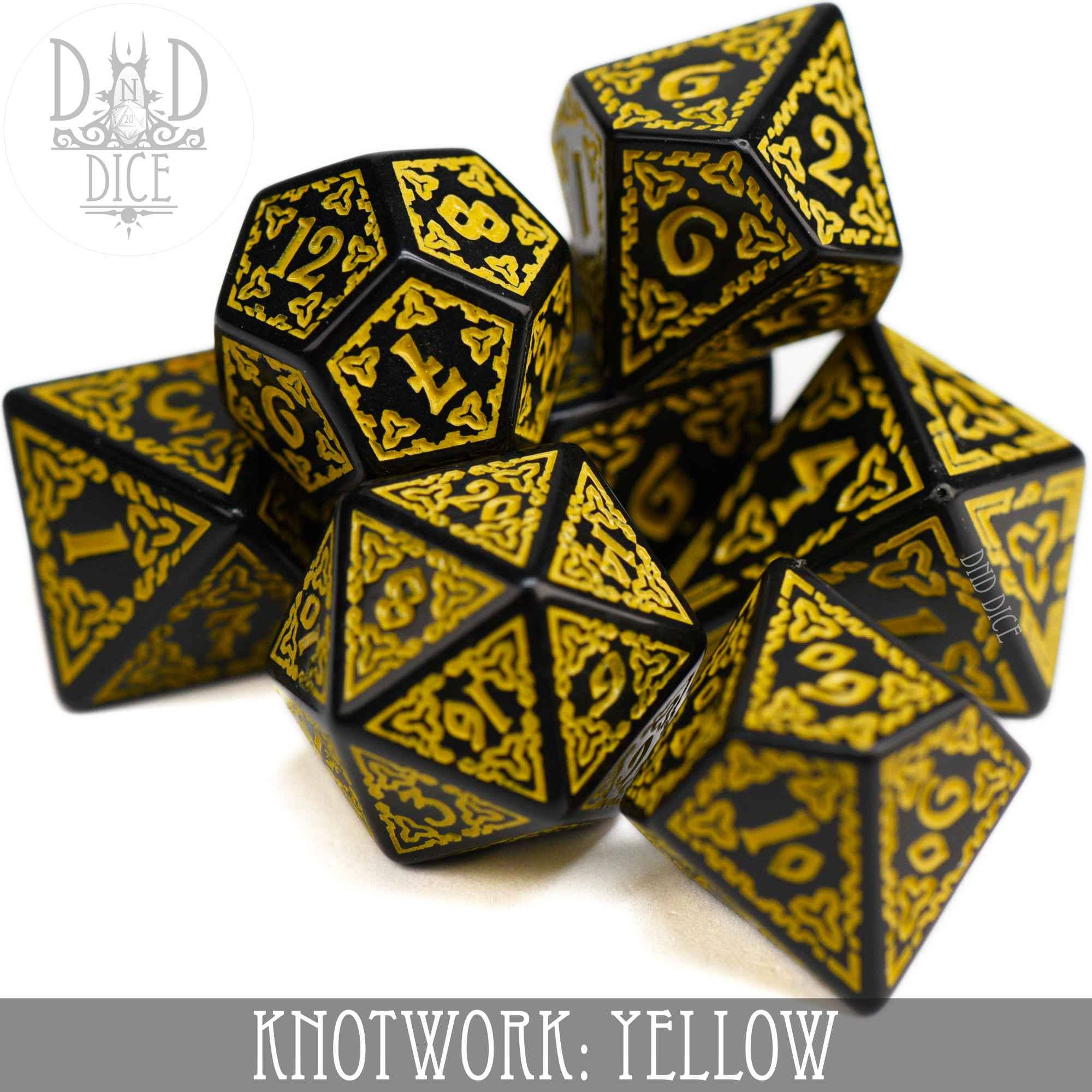 Knotwork: Yellow, set of 7 acrylic dice with gold designs, includes teardrop D4 and ornate D20.