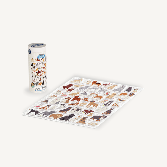 Dog Lovers 1000 Piece Jigsaw Puzzle, completed and in box, both featuring illustrated dog breeds.