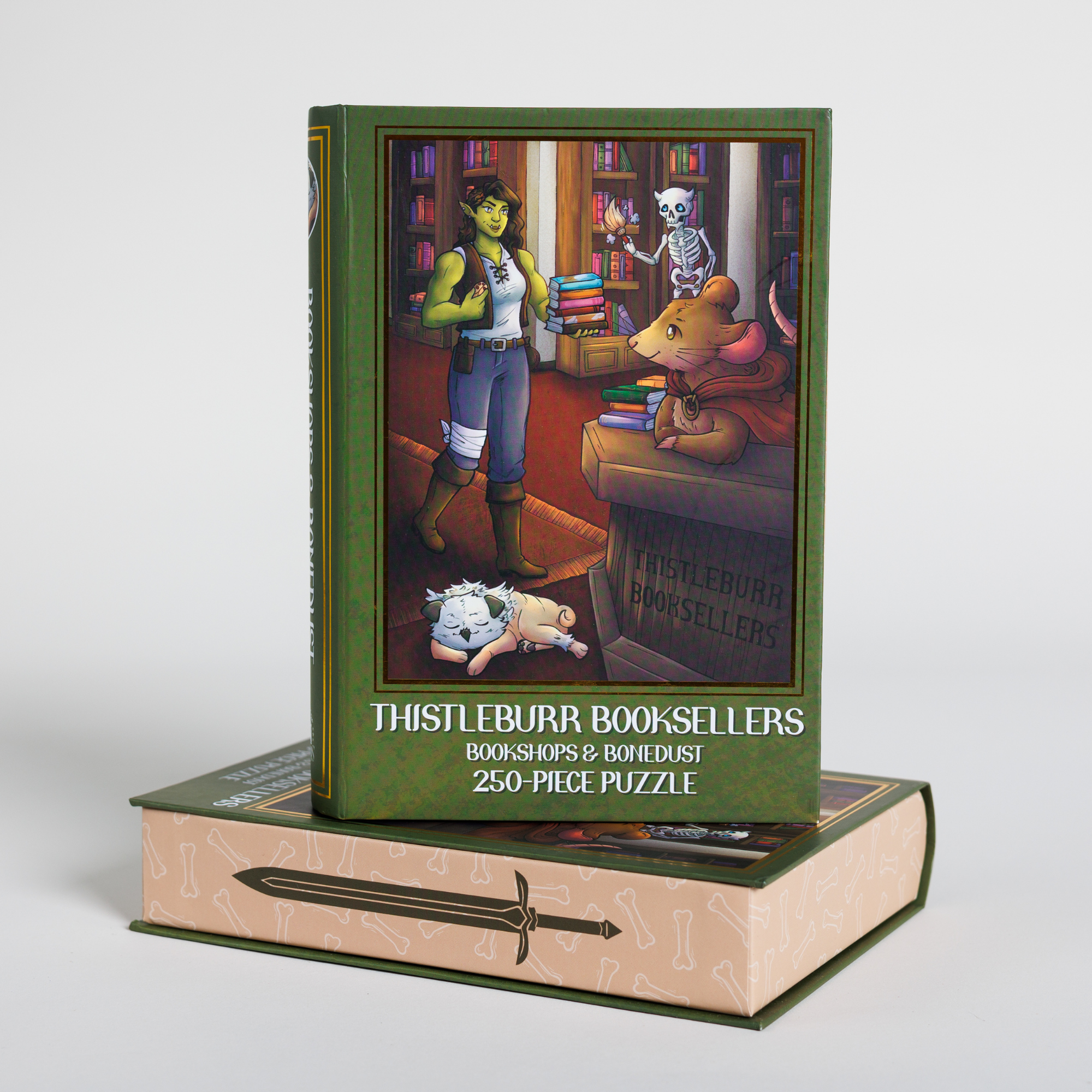 Thistleburr Bookshop Keepsake Puzzle with fantasy characters in a book-shaped box.