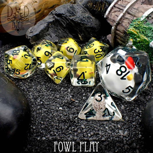 Fowl Play 8 Dice Set of clear resin dice with yellow chicks inside.