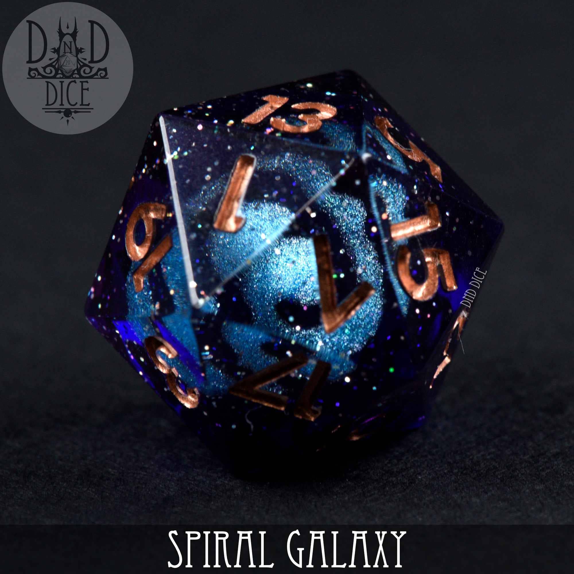 Spiral Galaxy Handmade dark blue resin die with glitter and gold numbers.