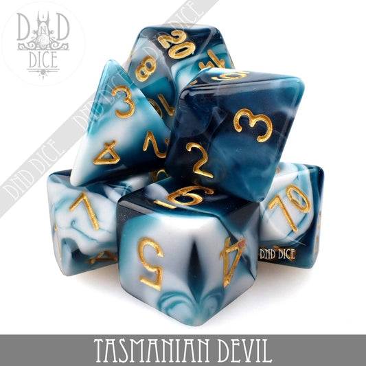 Tasmanian Devil 7 or 11 DND polyhedral dice set in blue, black, and white with gold numbers.