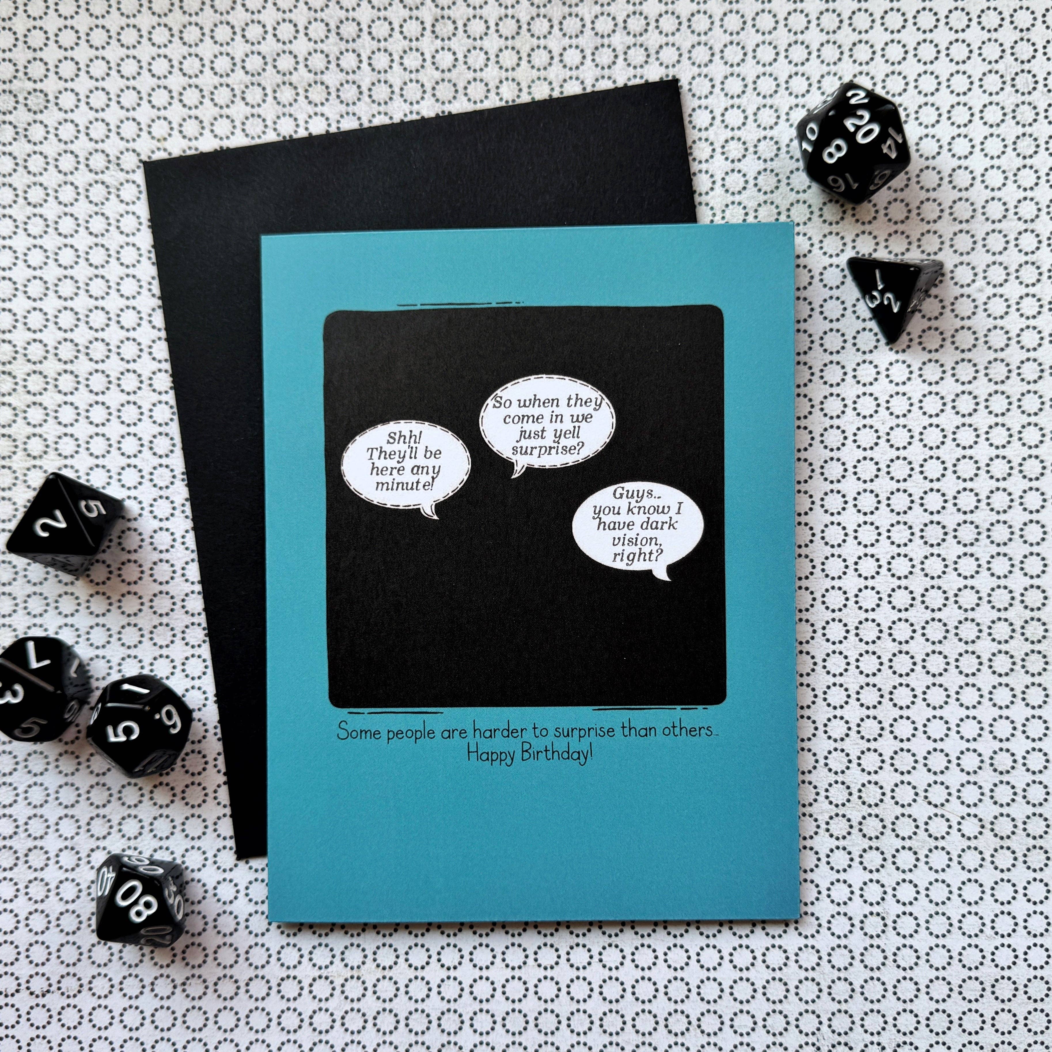 Dark Vision Surprise D&D/RPG birthday card with dice and black envelope; reads: Some people are harder to surprise.