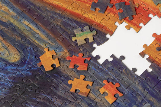 Puzzle featuring Edvard Munchs The Scream with some missing pieces, modern art style.