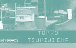 Small industrial vehicle branded Tokyo-Series Tsukiji Market Expansion at Tokyo Tsukiji Market.