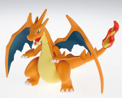 Bandai Pokémon Mega Charizard Y model kit with blue wings and flaming tail, standing on two legs.