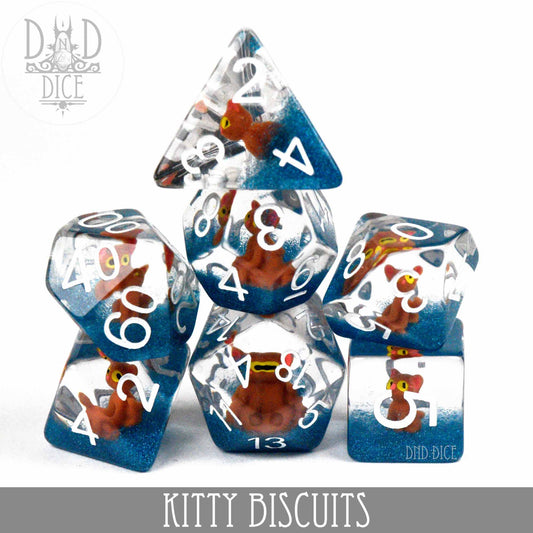Kitty Biscuits polyhedral 7-dice resin set with orange cats inside, for DnD, shown on a white background.